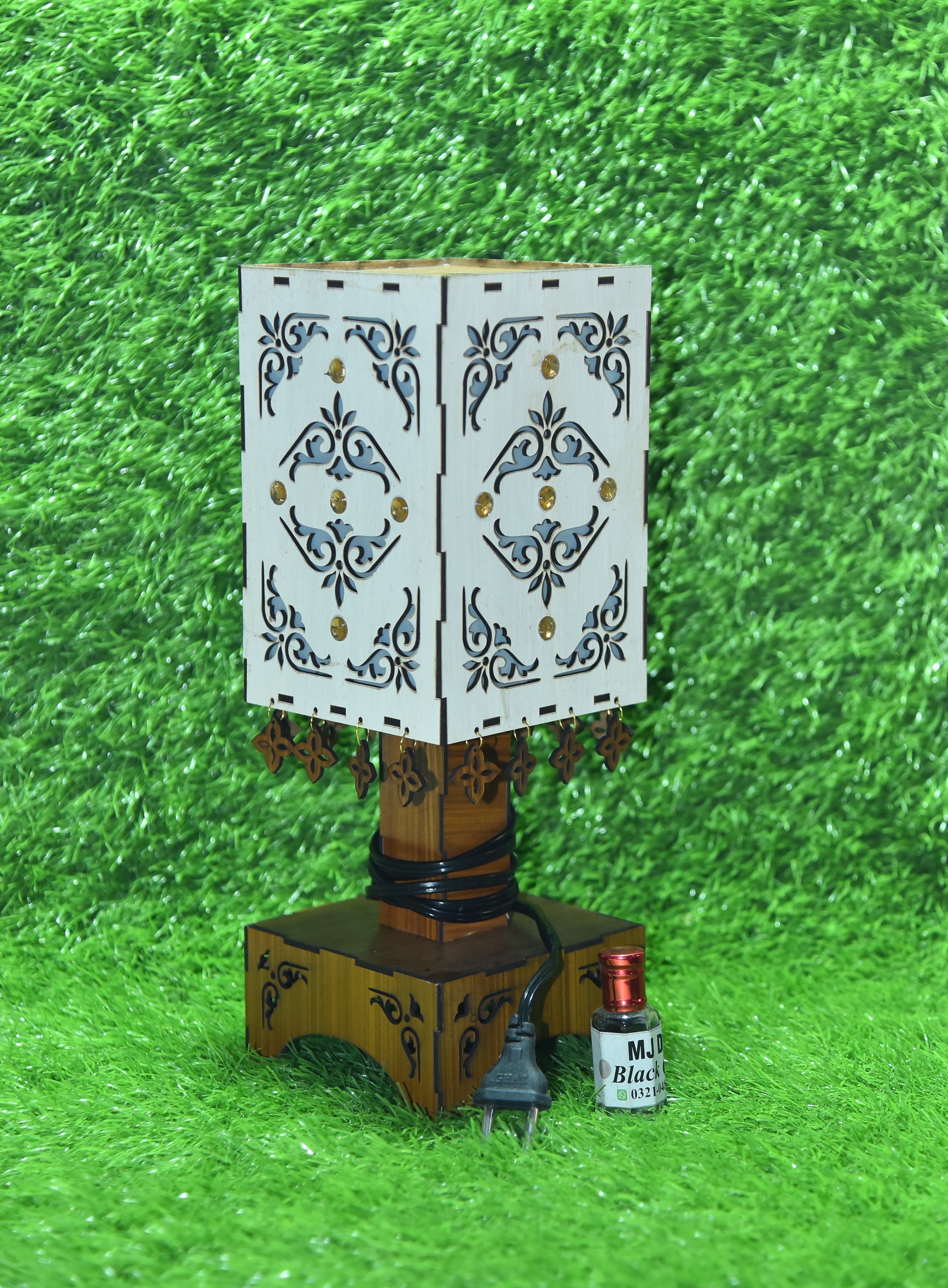 Buy 1 Royal Arabesque Wooden Laser-Cut Lamp, Get 1 Attar Bottle FREE! (Limited Time Offer)